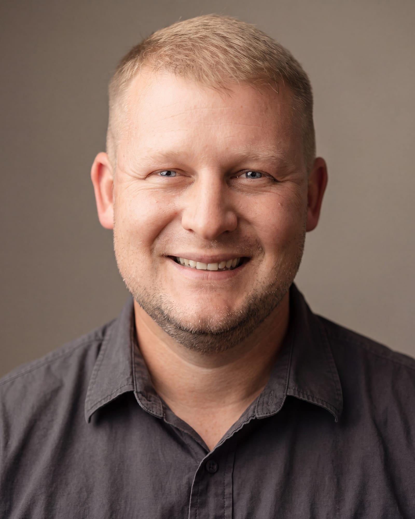 Portrait of Adam Little, lead designer at Frusterio Design